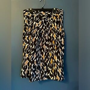 Satin pleated classy skirt with slight sheen.